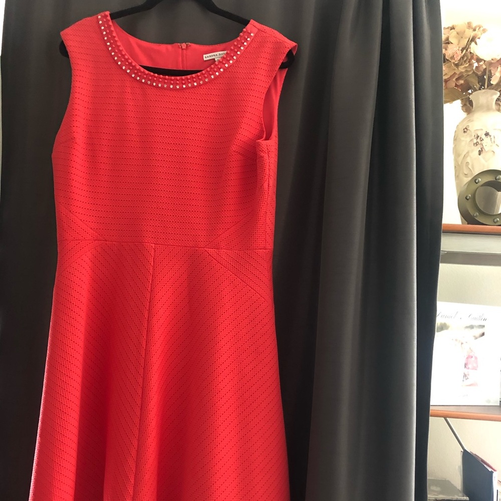 Coral dress with embellished neckline